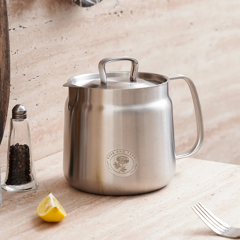 Rose and Stainless Steel Fryer showing entire product 1.5L on a counter top