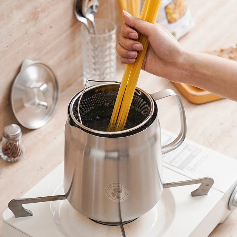 Rose and Stainless Steel Fryer showing spaghetti boiling