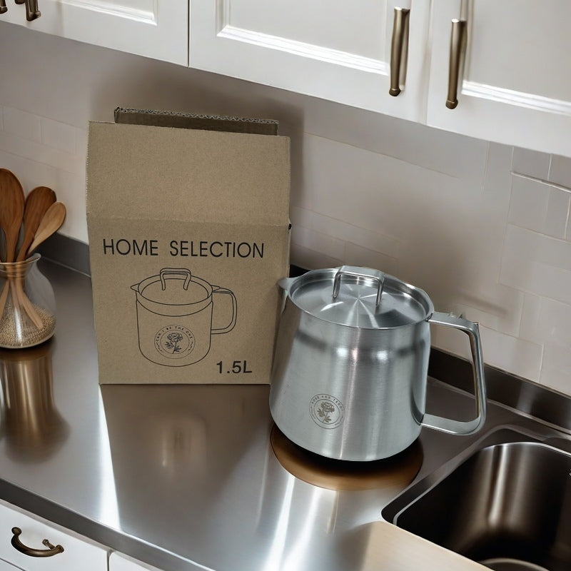 Rose and Stainless Steel Fryer with packing, lid and main fryer on counter top