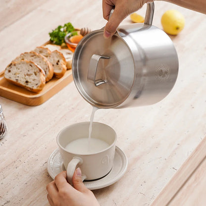 Rose and Stainless Steel Fryer showing milk boiling and pouring into cup