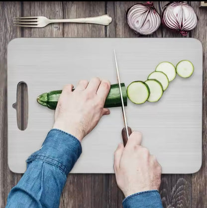 Rose and Teddy Stainless Steel cutting board with women chopping cucumber 